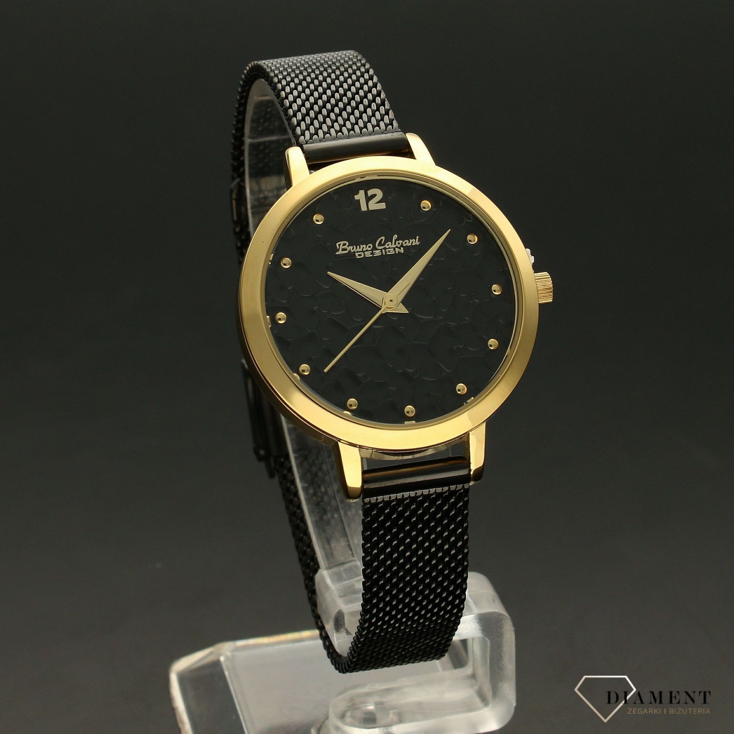 Zegarek damski Bruno Calvani BC2532 'Stylowa czerń' Zegarek damski w idealnym i modnym połączeniu kolorów. Czarny i złoty to kolory które zawsze świetnie się prezentują i elegancko wyglądają na kobiecym nadgarstk.jpg